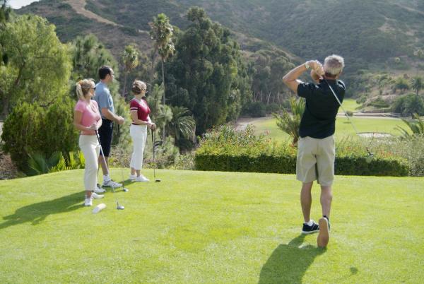 040 a group of people on a golf course